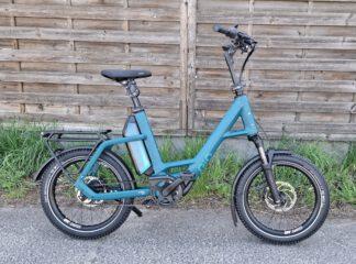 Qio Compact CX5x (2026) petrol blue matt – 20″ Kompaktrad